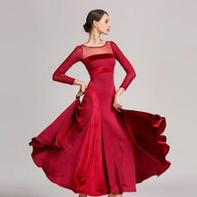 Load image into Gallery viewer, Woman in a red dress lifting up the ruffled end