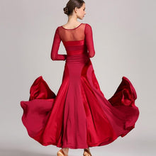 Load image into Gallery viewer, Woman standing straight up in a red dress with her back to the camera